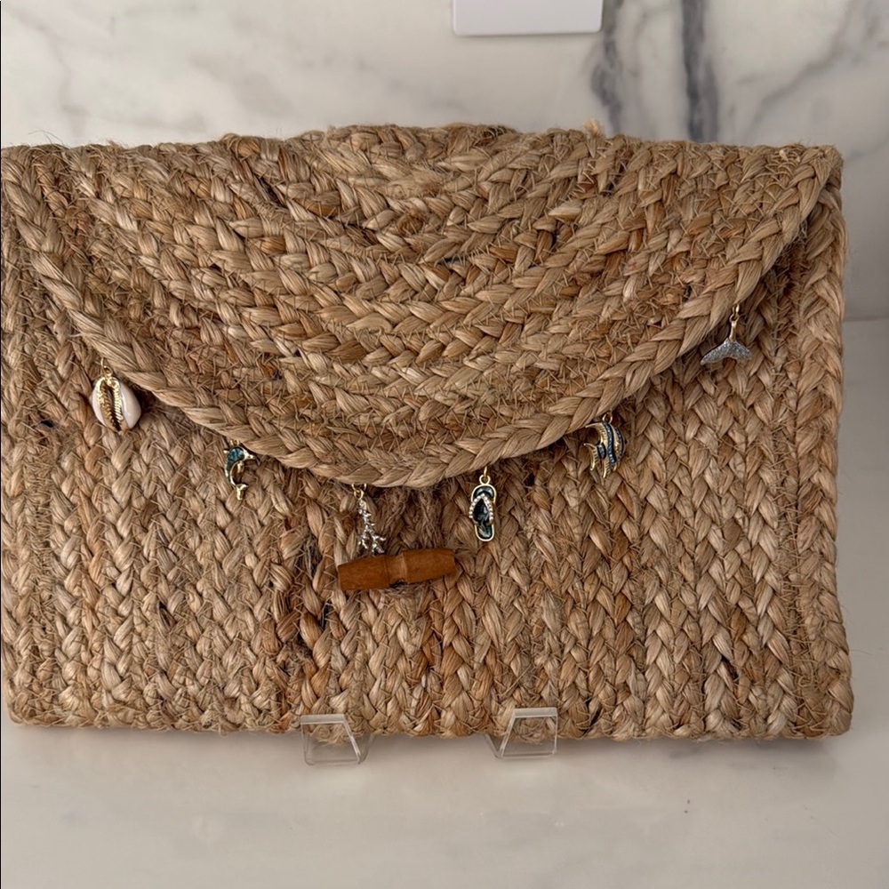 NWT Natural Woven Clutch with Charm Accents